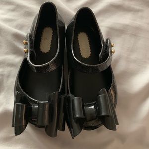 Mini Melissa black bow shoes
